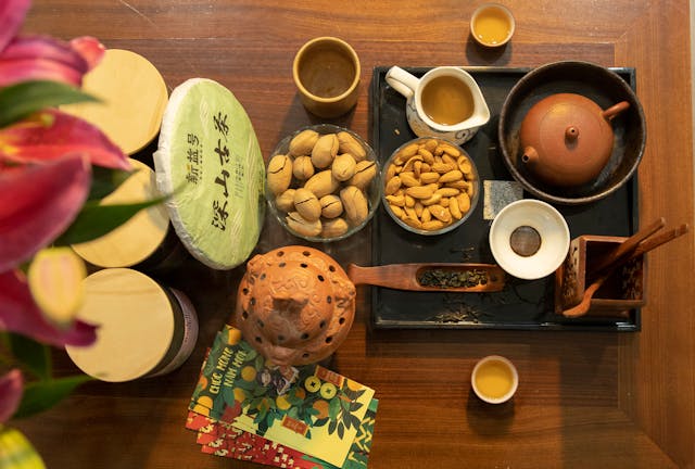 A calming nighttime scene with healthy snacks like almonds and herbal tea 