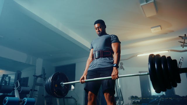 A person is performing Deadlifts complete body exercise