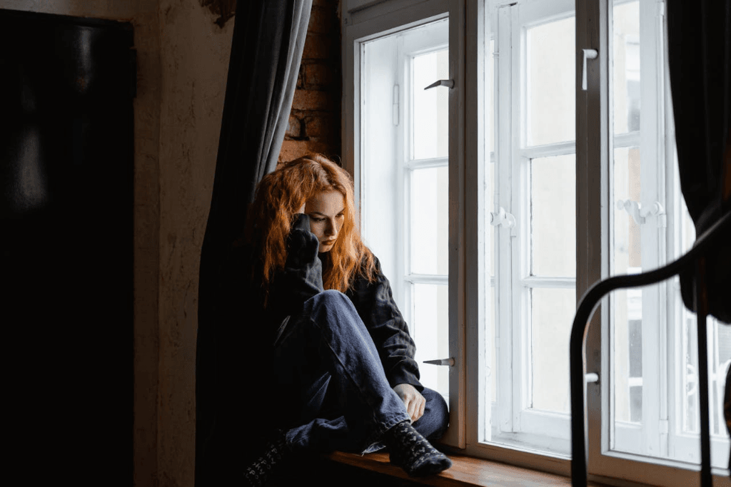 women is siting alone Mental Resilience